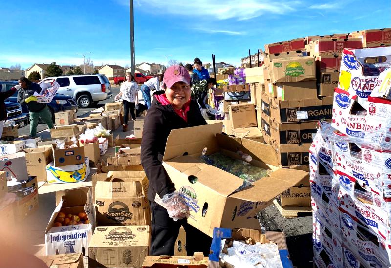 jeannette helping with an outreach